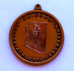 AZ Police Ath. Fed. Medal Copper w/raised Copper Torch - Military Patches and Pins